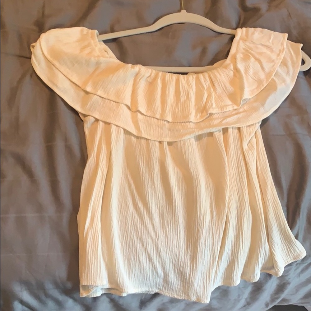 Cream colored off the shoulder shirt